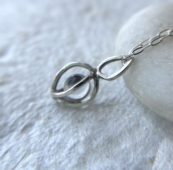 Sterling silver gem pod necklace with your choice of beads.