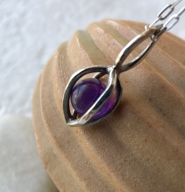 Sterling silver gem pod necklace with your choice of beads.