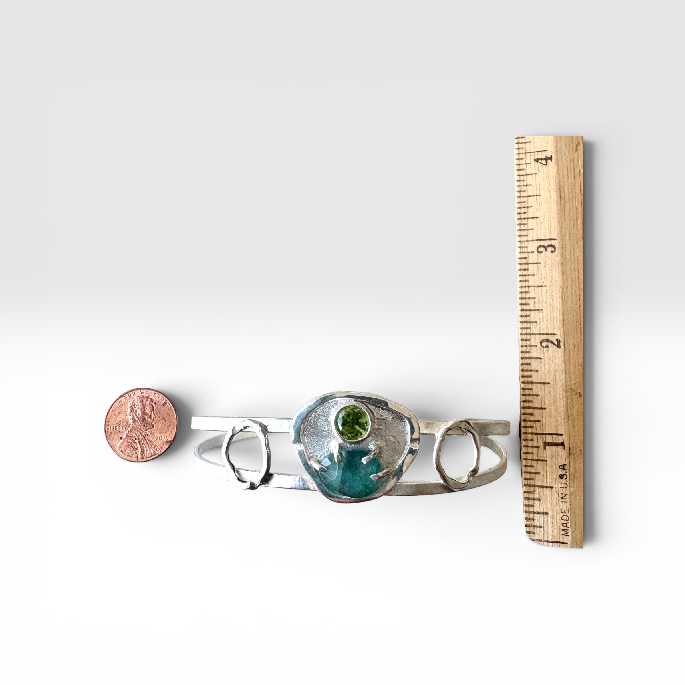 Blue Topaz and Peridot Nurture Bracelet measure